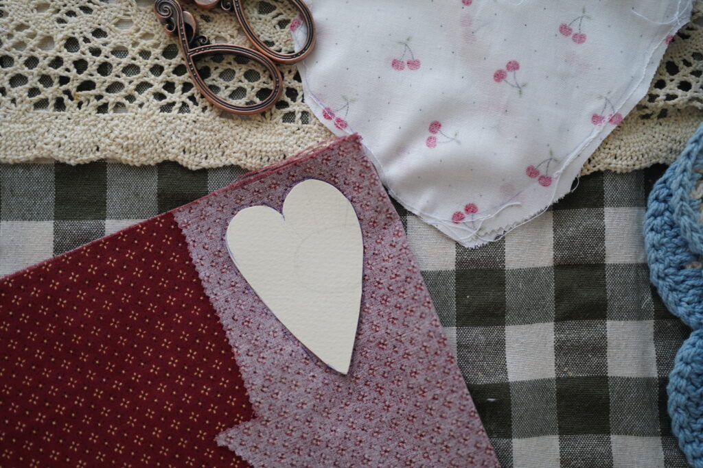 a heart wing pattern traced on the contrasting fabric to create wings